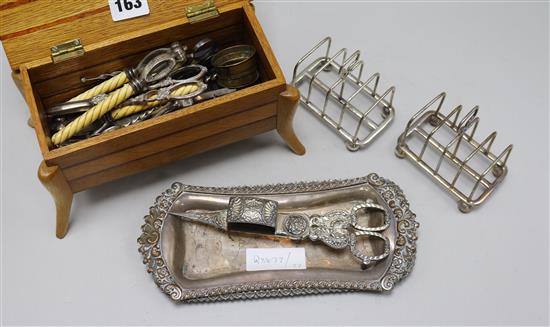 A quantity of mixed plated snuffers, a toast rack etc
